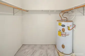 The primary walk-in closet is quite large!