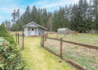 Garden space, potting shed and green house.