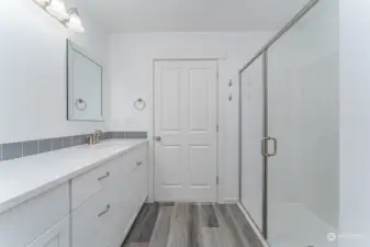 Primary bathroom with large shower and double sink