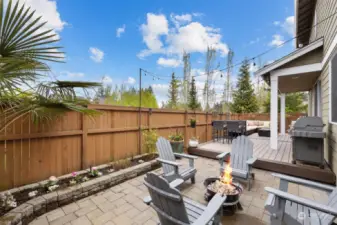 You will fall in love with this backyard!! Notice the garden space along the fence.