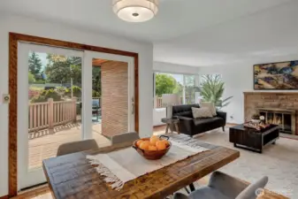 From the dining area French doors open to the large W/SW facing deck.