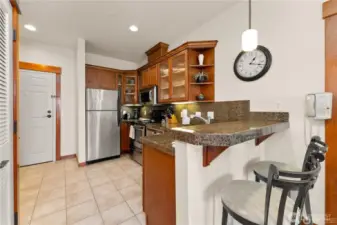 Granite counters and stainless appliances.