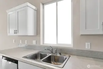 Photo is of a similar home. Colors and materials may vary.