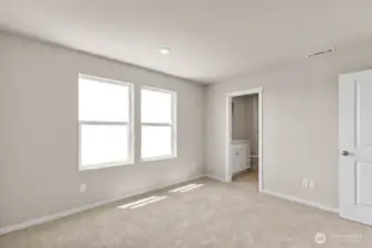 Photo is of a similar home. Colors and materials may vary.