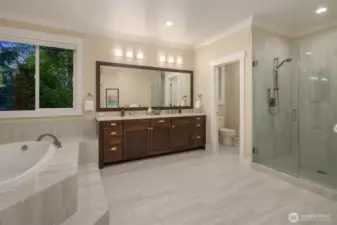 Primary bathroom with heated floors and jetted rub