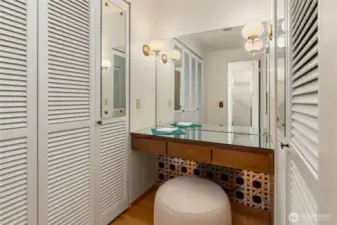 Cute makeup and closet area off primary.