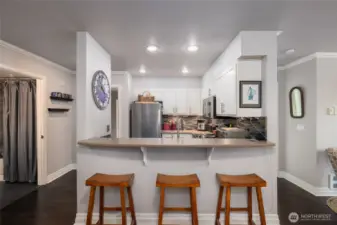 The updated kitchen has a breakfast bar for convenient meals.