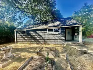 Side of the house/front door/ garden beds