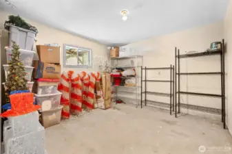 Bonus room off the garage - ideal for hobbies, projects, or storage. Christmas decor included with sale.