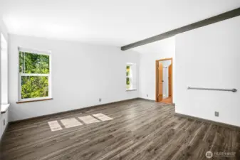 Spacious and private primary bedroom with ensuite.