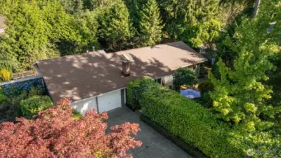 This incredibly private rambler is situated on a spacious, nearly 1/3 acre lot.