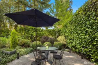 Patio area off the front entry. Great for morning coffee. This property is fully fenced and gated.