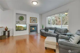 Gas fireplace & large windows make this room comfy & cozy.