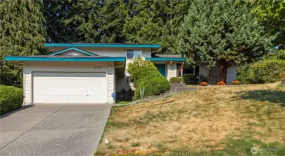Welcome to this beautifully maintained home in sought-after Fairwood Greens! Enjoy a bright, spacious layout with hardwood floors, large windows, and a cozy fireplace. The updated kitchen features stainless steel appliances, ample cabinet space, and easy flow to the dining area. The primary suite offers a private en suite and generous closet, while additional bedrooms provide versatility for guests or an office. A fully finished lower level includes a bonus/flex space and convenient 3/4 bath. Outside, relax in your private backyard with mature trees, patio space, and room to entertain. Peace of mind with Lifetime Timberline HD roof! Enjoy being close to parks, shopping, dining, schools, FWGCC and nearby commuter routes.