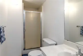 Convenient lower-level 3/4 bath perfect for guests or everyday ease.