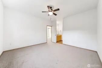 Another view of the primary bedroom