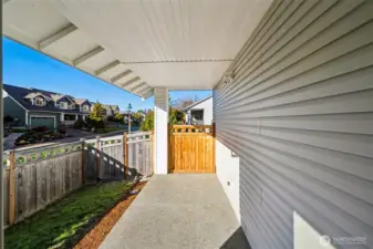 Another view of the covered patio and yard