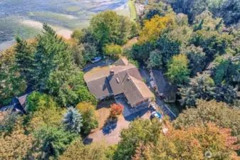 Overview of the main house and detached shop.