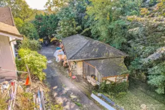 This is a great detached shop approximately 18' x 60' not counting extra storage on back.