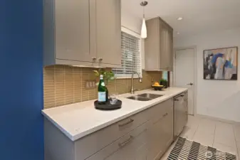 Updated kitchen with lots of cabinets.