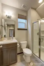 Downstairs 3/4 BATH OFF OF BEDROOM DOWNSTAIRS. PERFECT FOR EXTENDED FAMILY OR GUESTS.