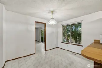 The dining room seamlessly flows to the family room.