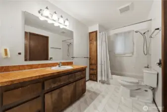 Very spacious bathroom with huge vanity space and plenty of storage.