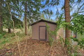 Storage shed included!