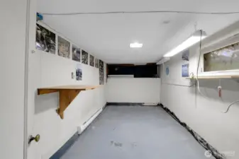 Large room at the bottom of the stairs.