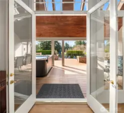 The 1,000+ sq ft covered deck with skylights offers refined, year-round outdoor entertaining in every season.