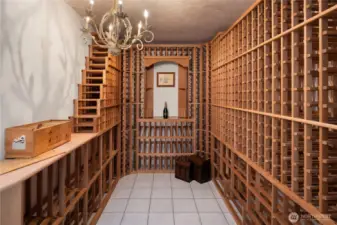 The temperature-controlled wine cellar is wrapped in rich cedar, offering an aromatic, old-world ambiance.