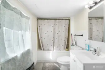 Full bath off of laundry/kitchen