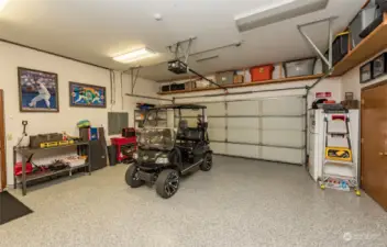 2 car Garage with epoxy floors and additional golf cart garage