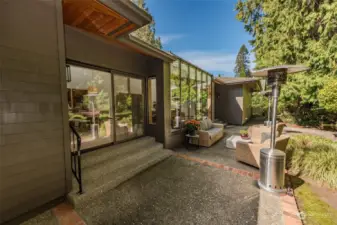 Aggregate concrete patio with sliding door access