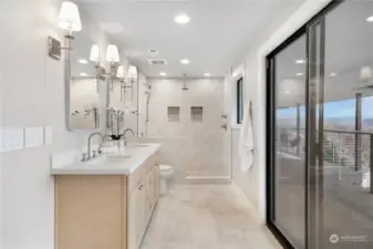 Resort like master with soaker tub and walk in tile surround shower with super convenient access to the exterior deck.