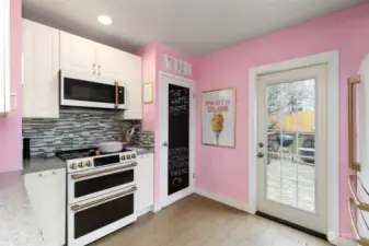 Kitchen door leads to the backdeck and the chalkboard door leads down to the basement