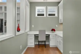Fantastic and light filled den with built-ins. If you want to enclose this space Plantation shutters would look beautiful.