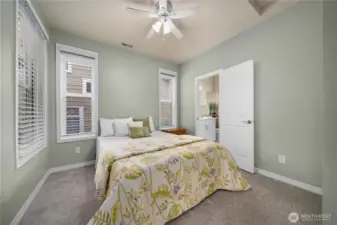 Guest suite with custom blinds and blackout shades.