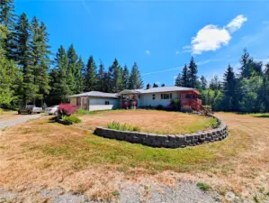 Welcome home! Tons of driveway parking and 2 car attached garage with access to the kitchen.