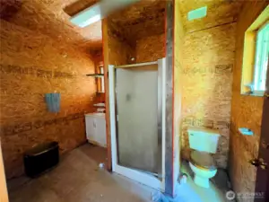 Bathroom in the middle garage with separate entrance, easily converted into DADU/MIL unit.
