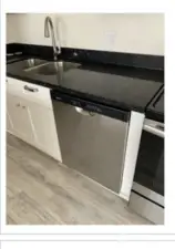 Unit 2 Stainless appliances make for a charming kitchen space