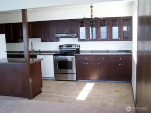 Unit 3 with an charming colored kitchen.