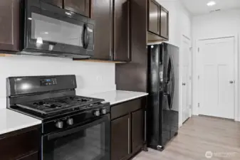 Kitchen w/ Gas Range