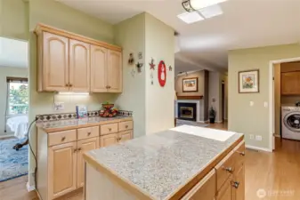 Island with granite countertop.