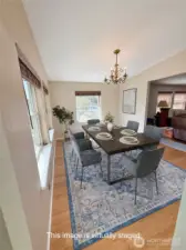 Virtually staged Dining room.