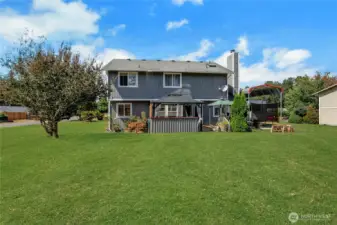 Looking at home from backside of the property.  Don't miss the fruit trees!