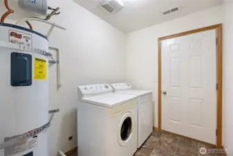 Laundry/mud room connects to the garage - Washer machine and dryer are included.