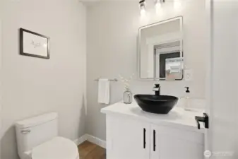 This half bath is conveniently located on the main floor and is great for when guests come to visit.