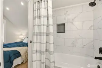 You can access the bathroom from the hall or from the primary suite.