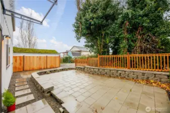 Large patio is great for adding additional exterior living space. You can put a barbeque and table and chairs out here and enjoy this area during the warmer seasons.